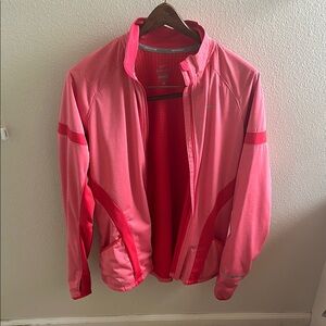 Nike Orange athletic Jacket Lightweight Wind-Resistant.  Fully lined.  Warm.